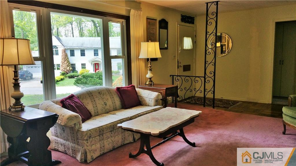 1 Maida Road Edison, NJ 08820 - Photo 3 of 17 a living room with furniture and a window