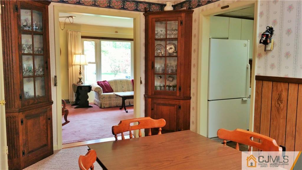 1 Maida Road Edison, NJ 08820 - Photo 6 of 17 a bedroom with a bed and a refrigerator