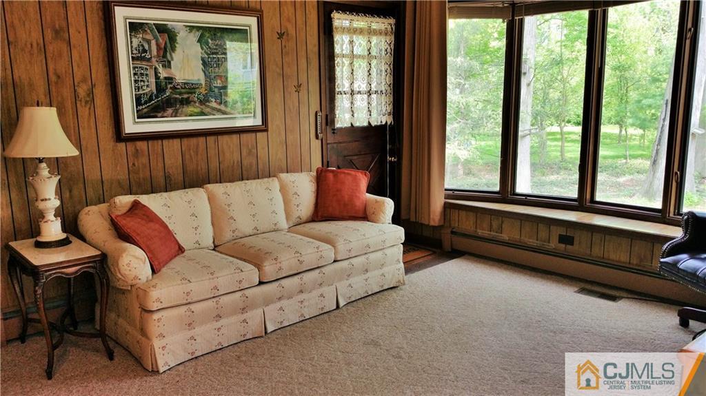 1 Maida Road Edison, NJ 08820 - Photo 7 of 17 a living room with furniture and a window