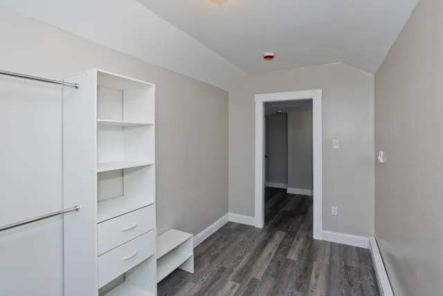 a view of an empty walk in closet