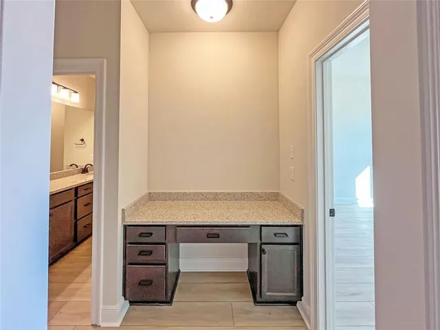 a room with closet and wooden floor