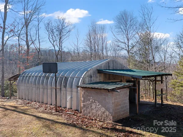 a view of a patio with wooden fence