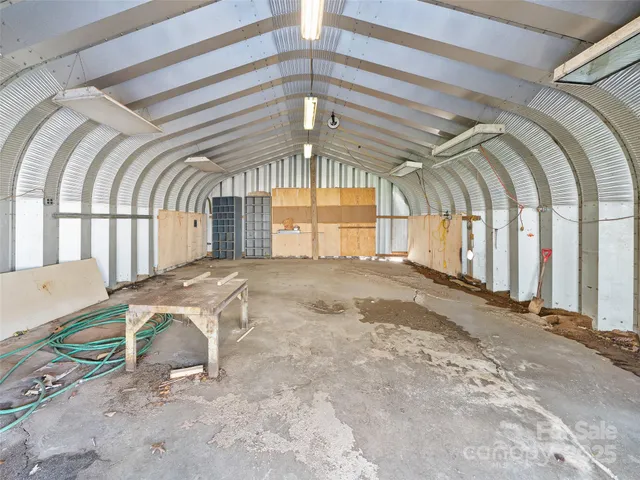 a view of a room with wooden walls