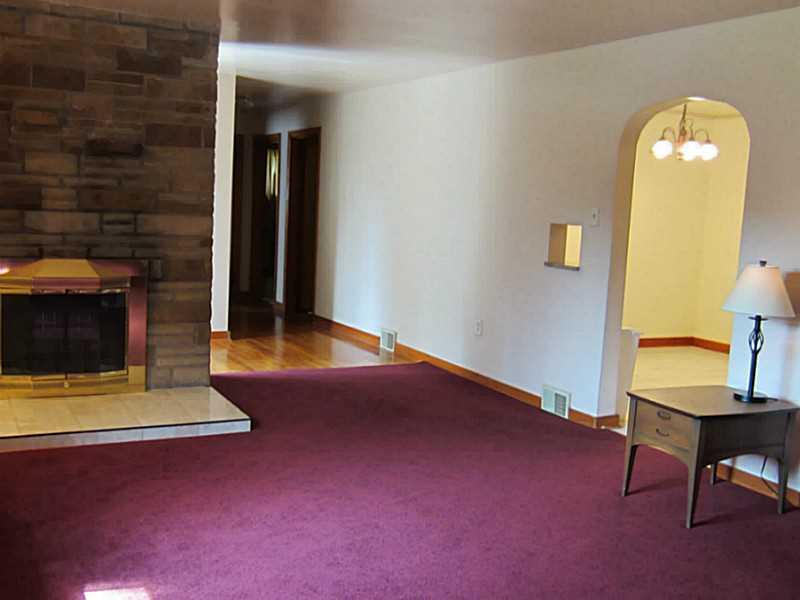 110 West Shaffer Road Aliquippa, PA 15001 - Photo 5 of 25 Living Room. Wood Burning Fireplace