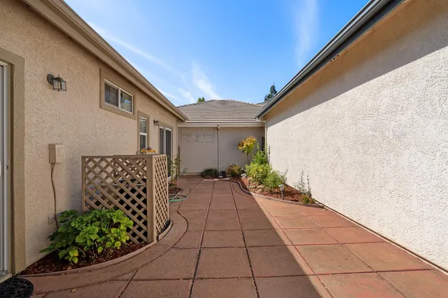 a backyard of a house with lots of green space
