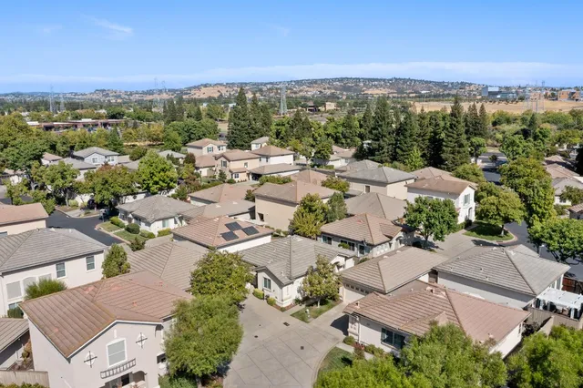 an aerial view of a city with lots of residential buildings