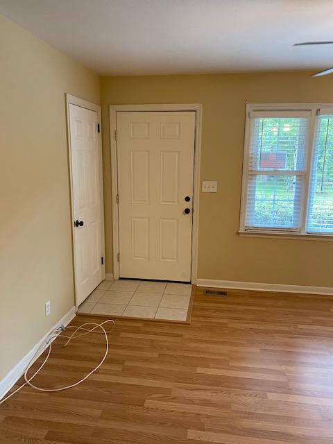 LIVING ROOM ENTRY AND COAT CLOSET