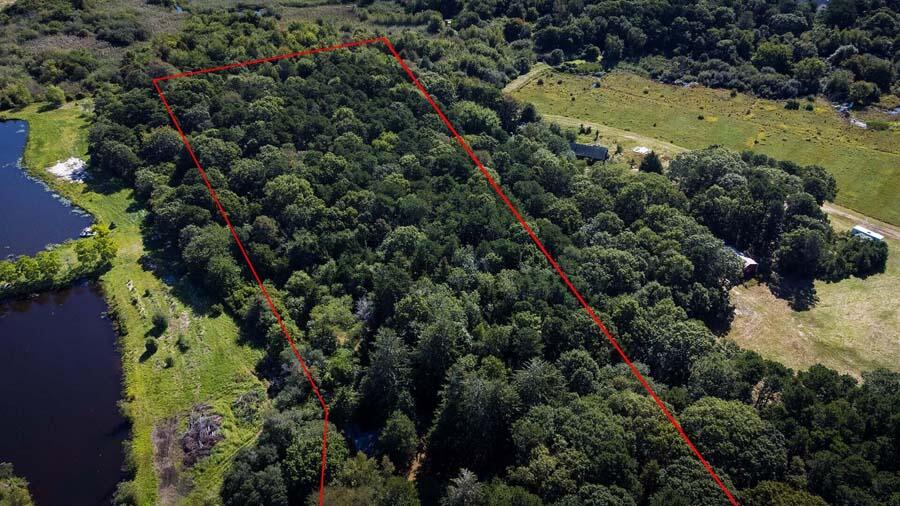 38 Roos Road East Sandwich, MA 02537 - Photo 3 of 12 an aerial view of a houses with a yard