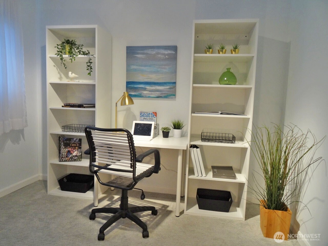 343 4th Avenue, Unit D Kirkland, WA 98033 - Photo 12 of 18 a view of a workspace with furniture and a window