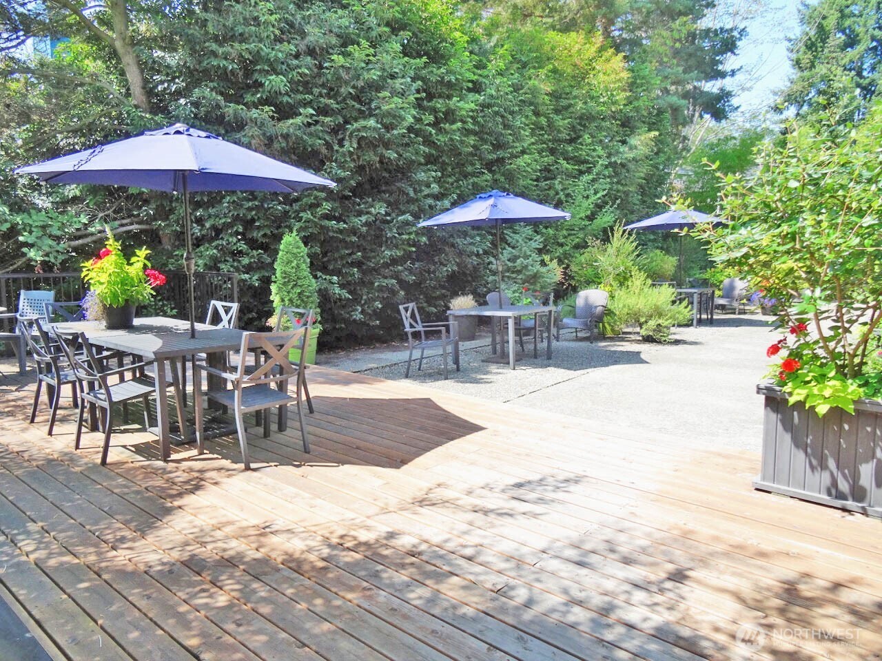 343 4th Avenue, Unit D Kirkland, WA 98033 - Photo 16 of 18 a patio with a patio table and chairs
