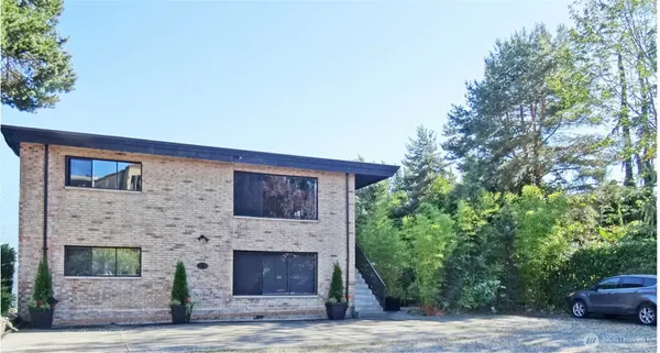 a front view of a house with yard