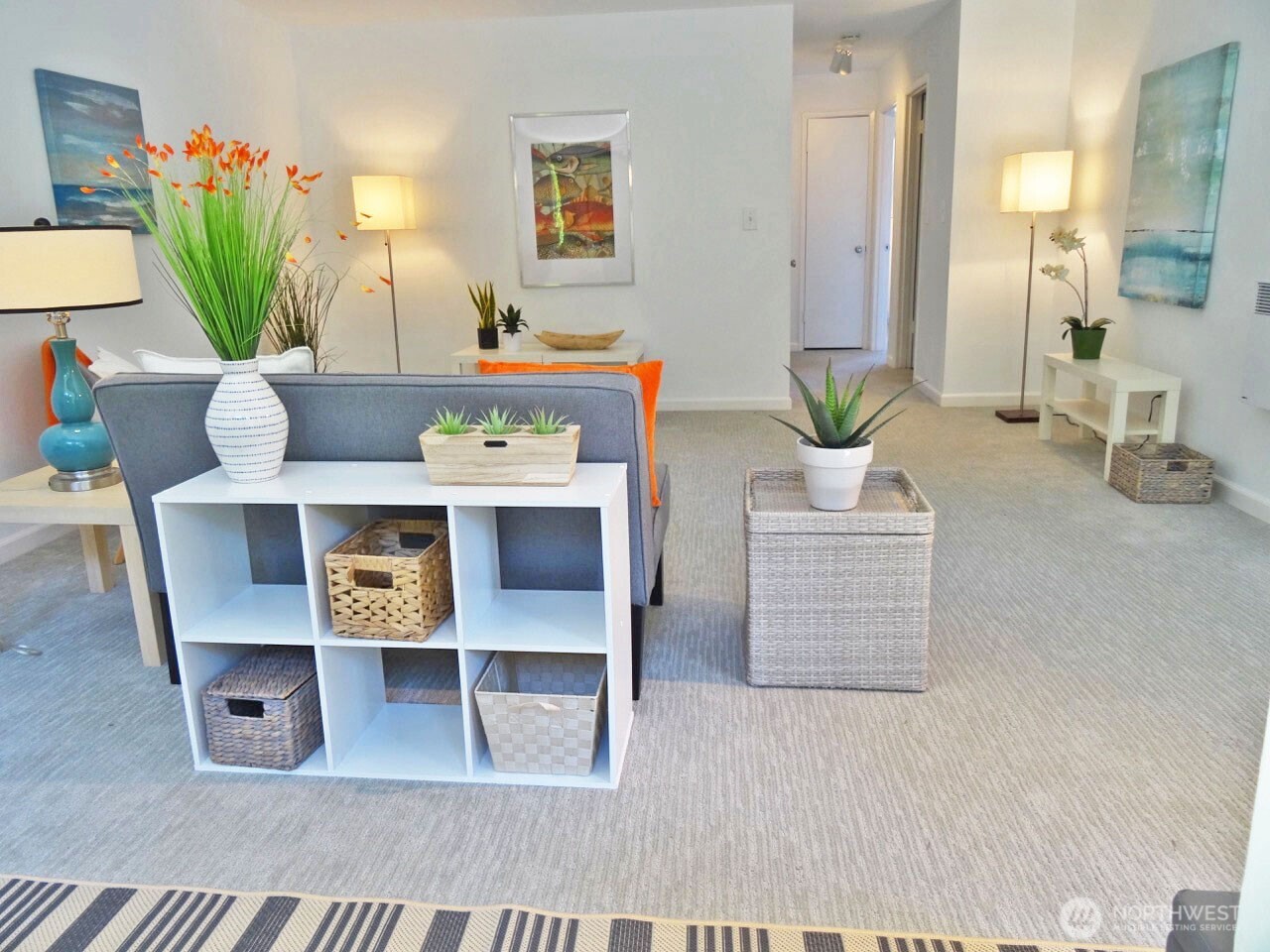 343 4th Avenue, Unit D Kirkland, WA 98033 - Photo 4 of 18 a living room with furniture a potted plant and kitchen view