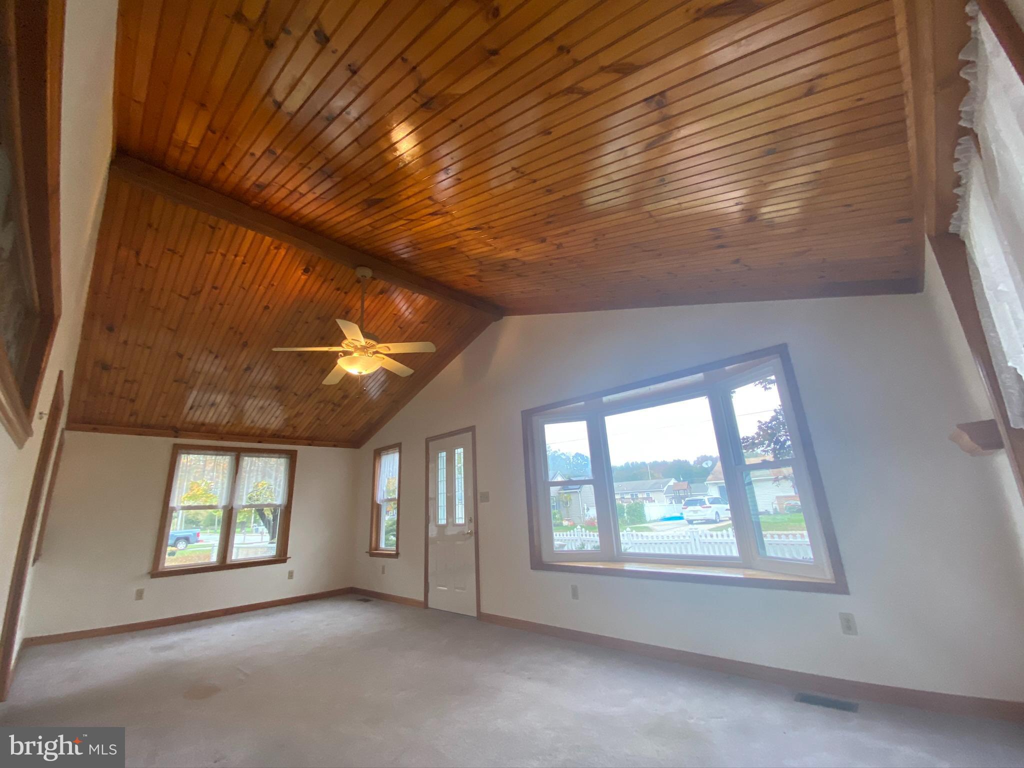 47 Harvard Road Pennsville, NJ 08070 - Photo 2 of 21 The front sunroom or sitting room. Gorgeous! 1/4