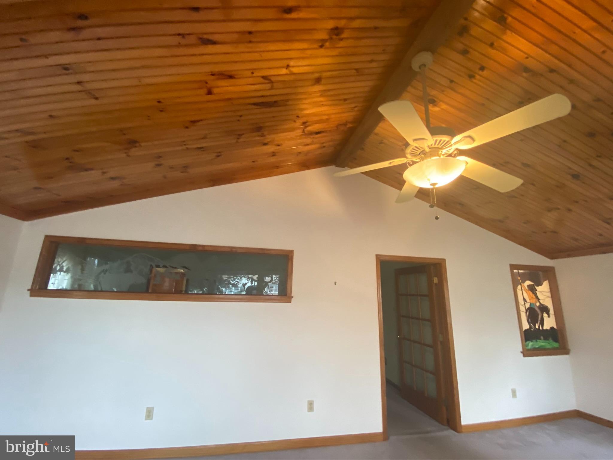47 Harvard Road Pennsville, NJ 08070 - Photo 3 of 21 Front sunroom / sitting room 2/4