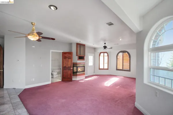 a view of a livingroom with a staircase