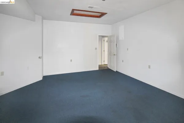 an empty room with closet