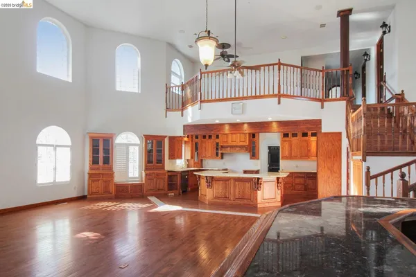 a view of a kitchen with furniture and a window