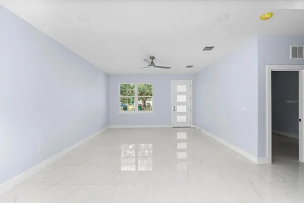 an empty room with windows