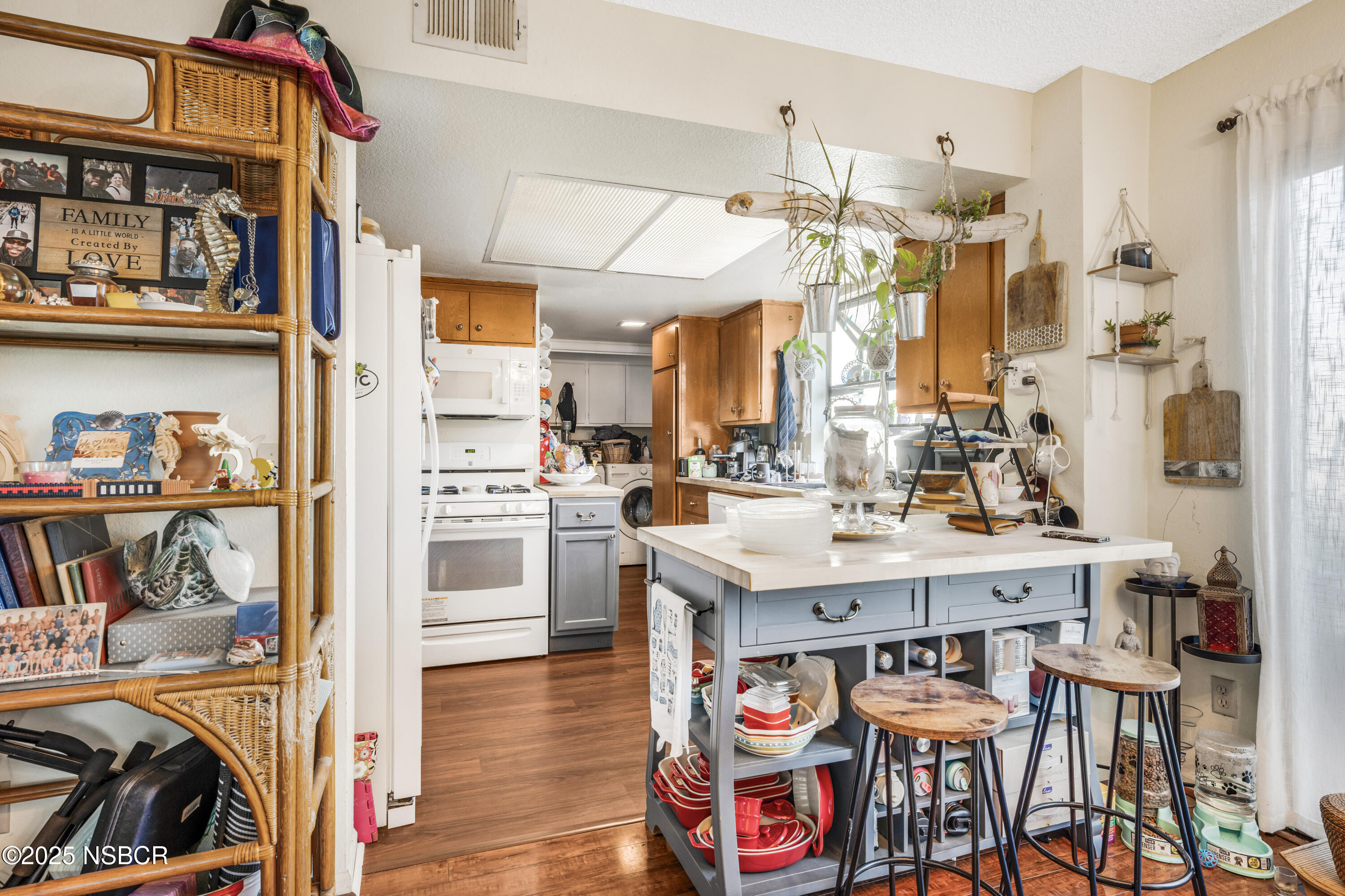 23 Village Cir Drive Lompoc, CA 93436 - Photo 6 of 16 a view of a kitchen and dining table