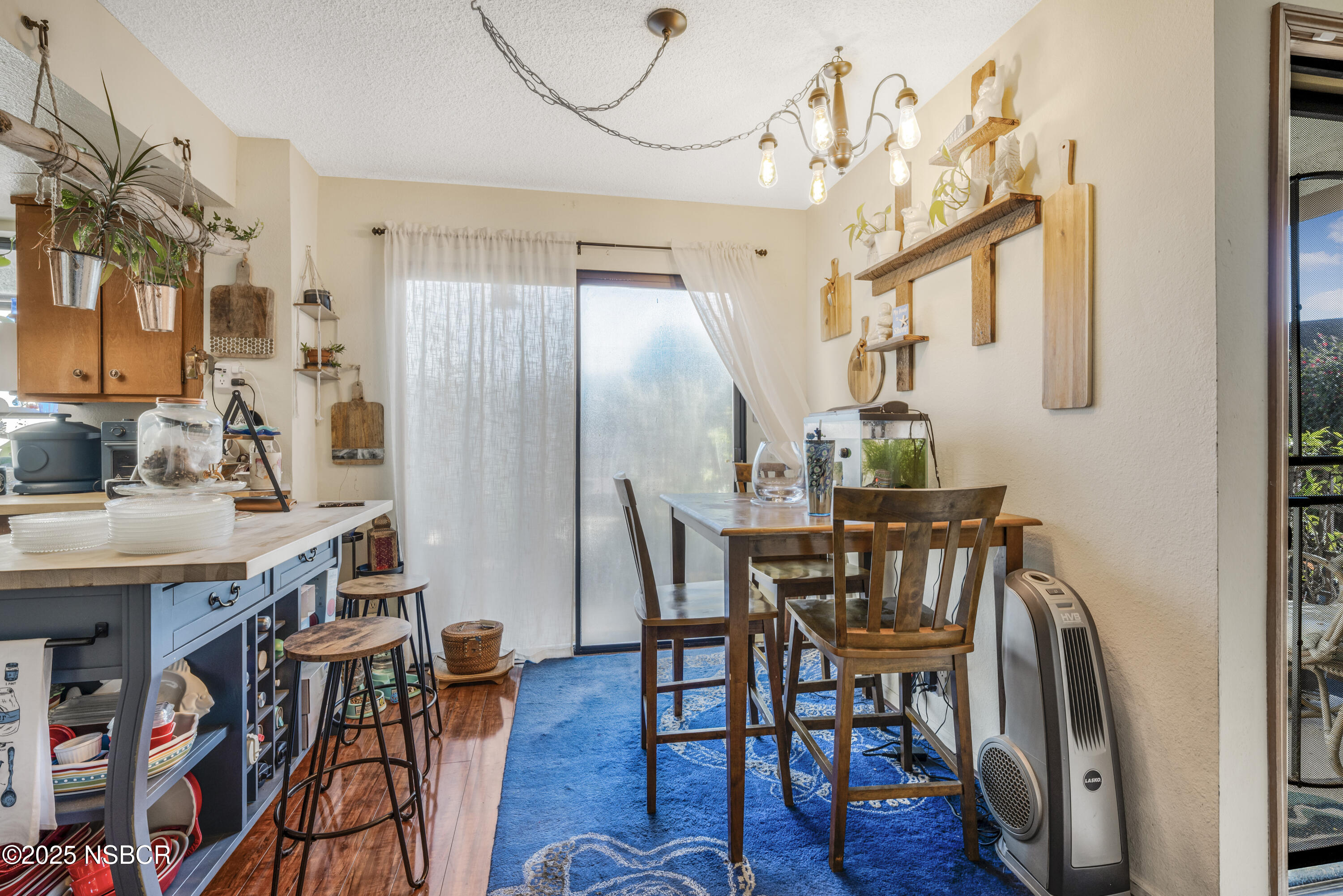 23 Village Cir Drive Lompoc, CA 93436 - Photo 9 of 16 a view of a dining room with furniture and wooden floor