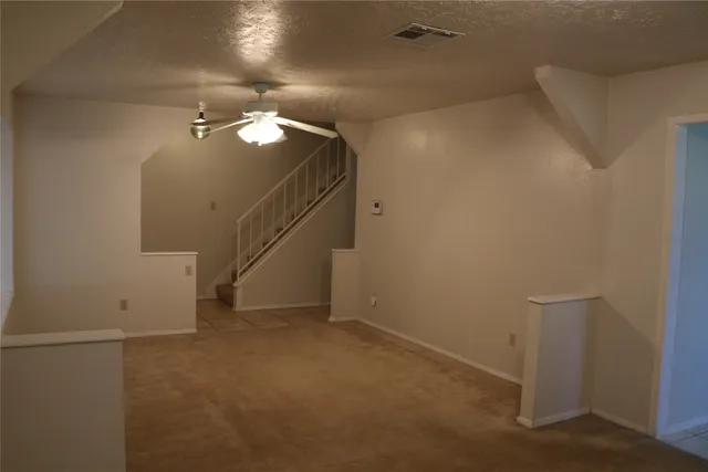 a view of a livingroom and window
