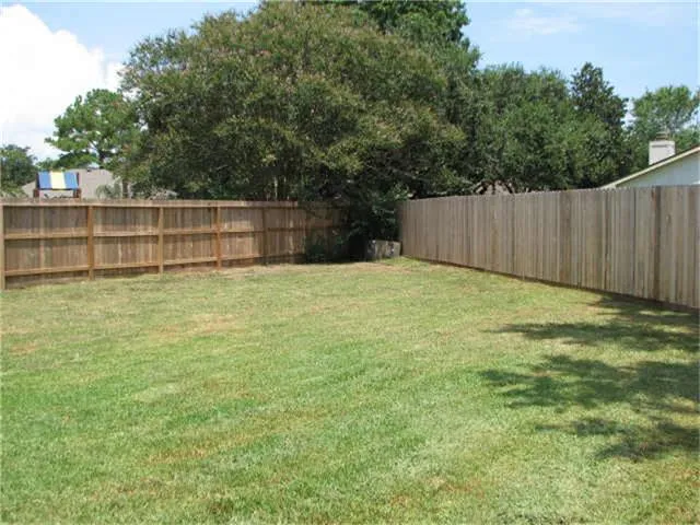 a view of a backyard with a garden