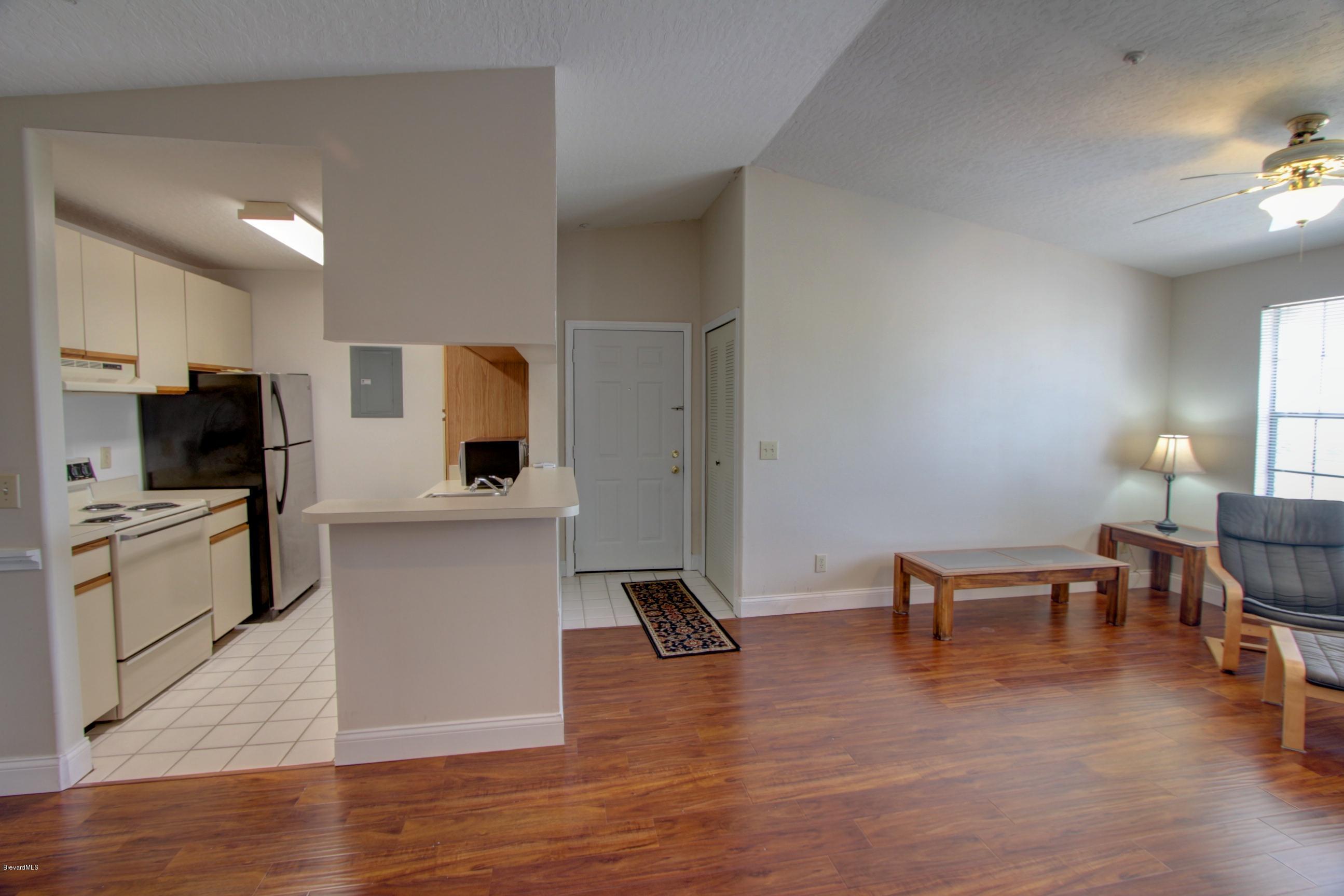 7667 North Wickham Road, Unit 420 Melbourne, FL 32940 - Photo 3 of 19 IMG_5233_4_5_Interior 2