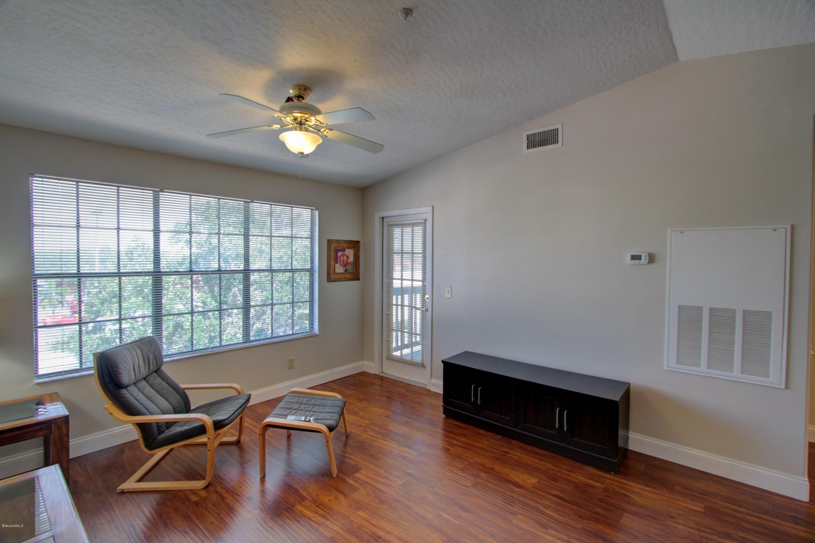 7667 North Wickham Road, Unit 420 Melbourne, FL 32940 - Photo 4 of 19 IMG_5203_4_5_Interior 2