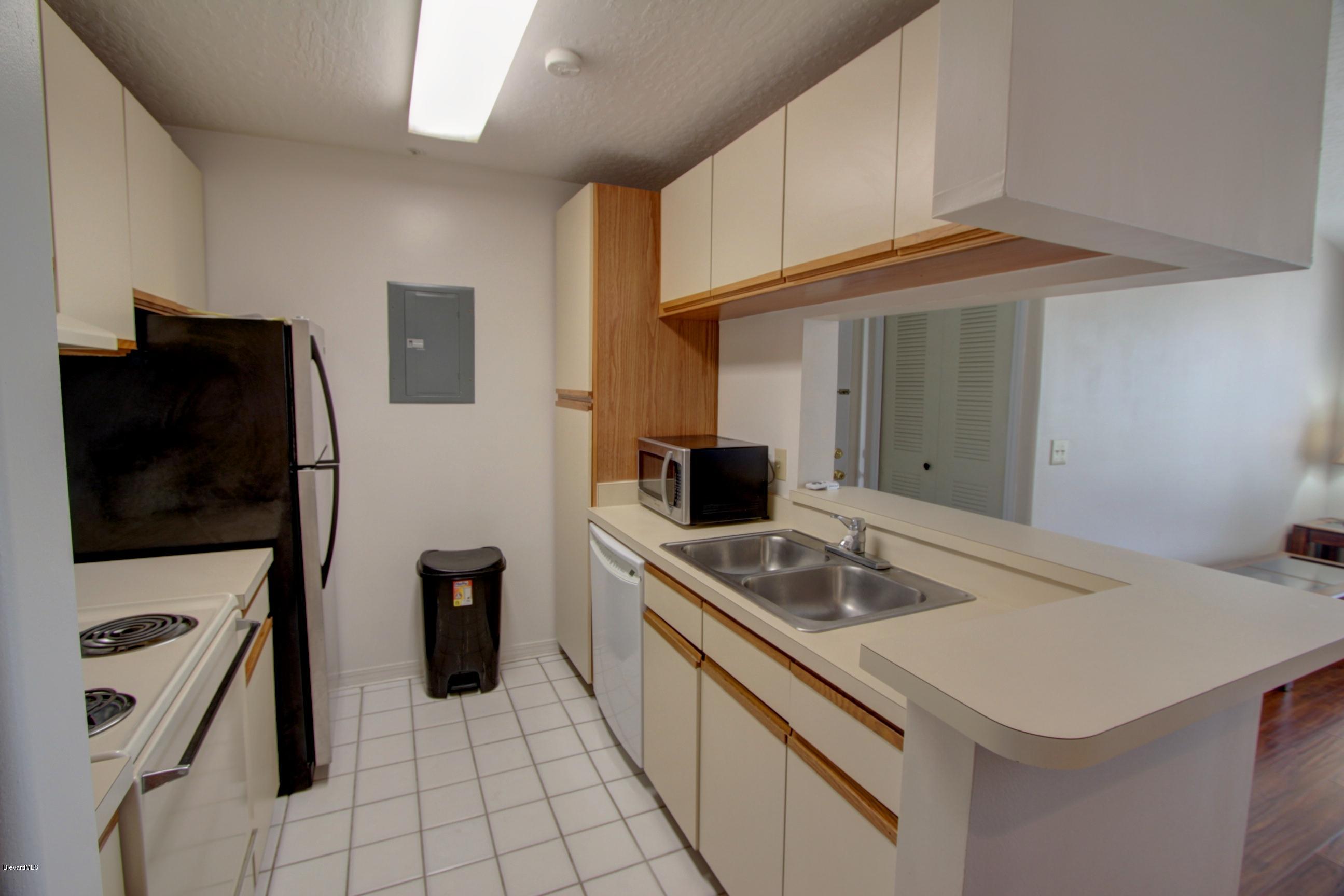 7667 North Wickham Road, Unit 420 Melbourne, FL 32940 - Photo 5 of 19 IMG_5254_5_6_Interior 2