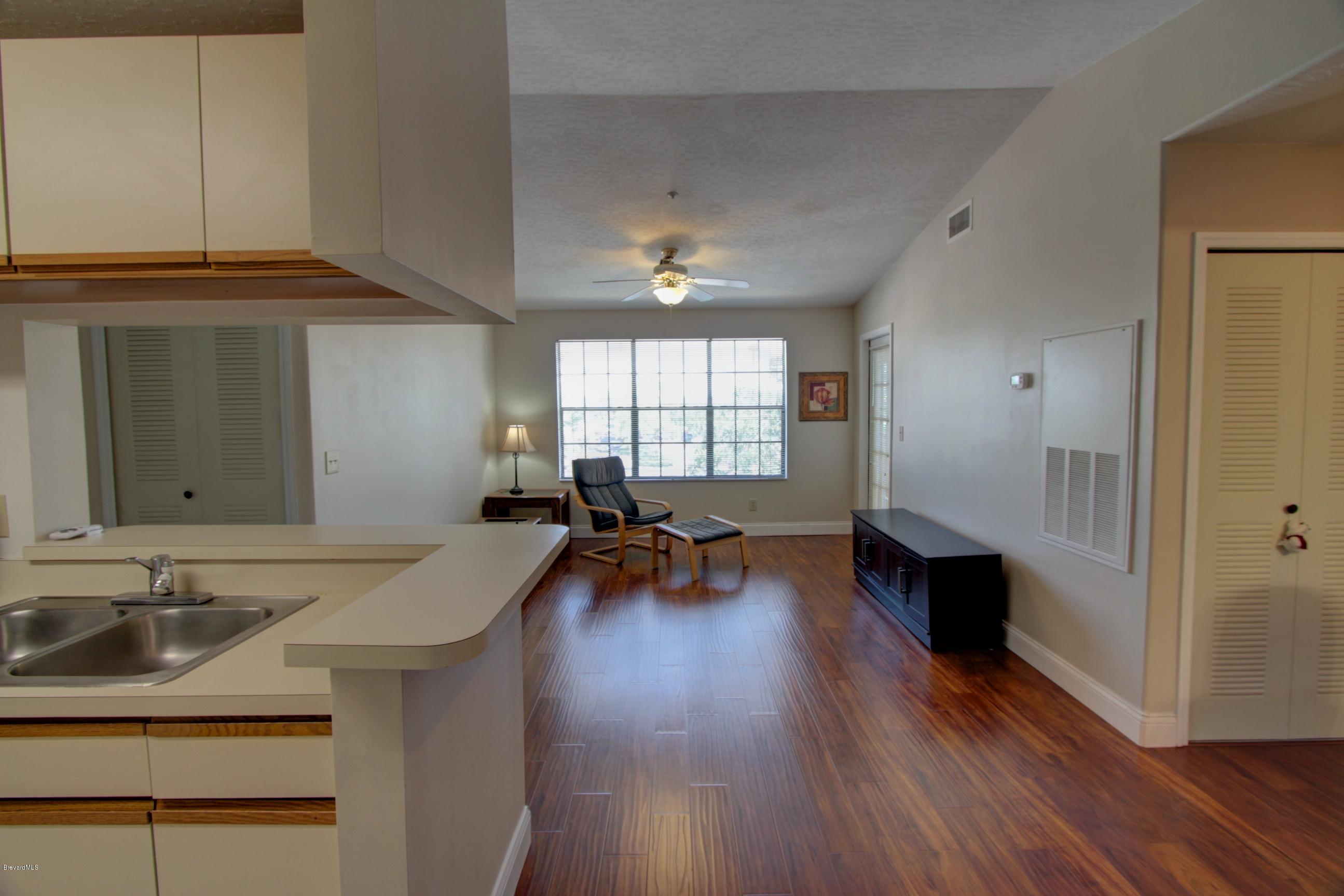 7667 North Wickham Road, Unit 420 Melbourne, FL 32940 - Photo 7 of 19 IMG_5239_40_41_Interior 2