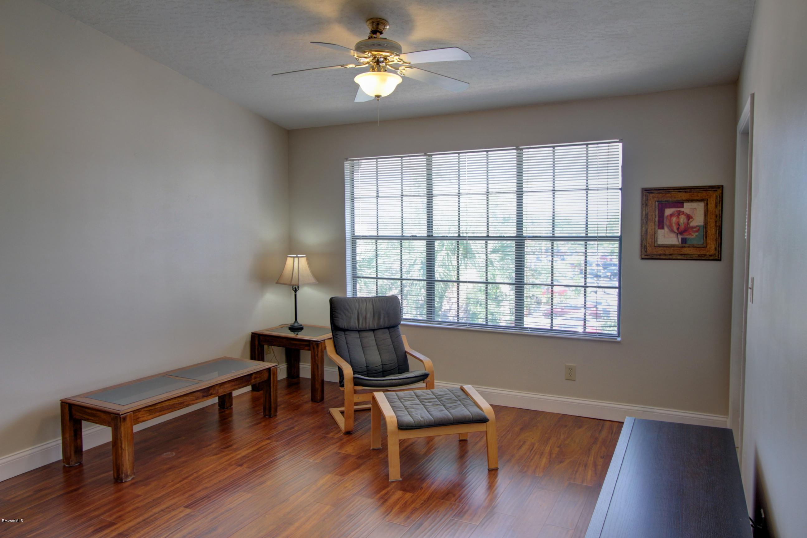 7667 North Wickham Road, Unit 420 Melbourne, FL 32940 - Photo 8 of 19 IMG_5242_3_4_Interior 2