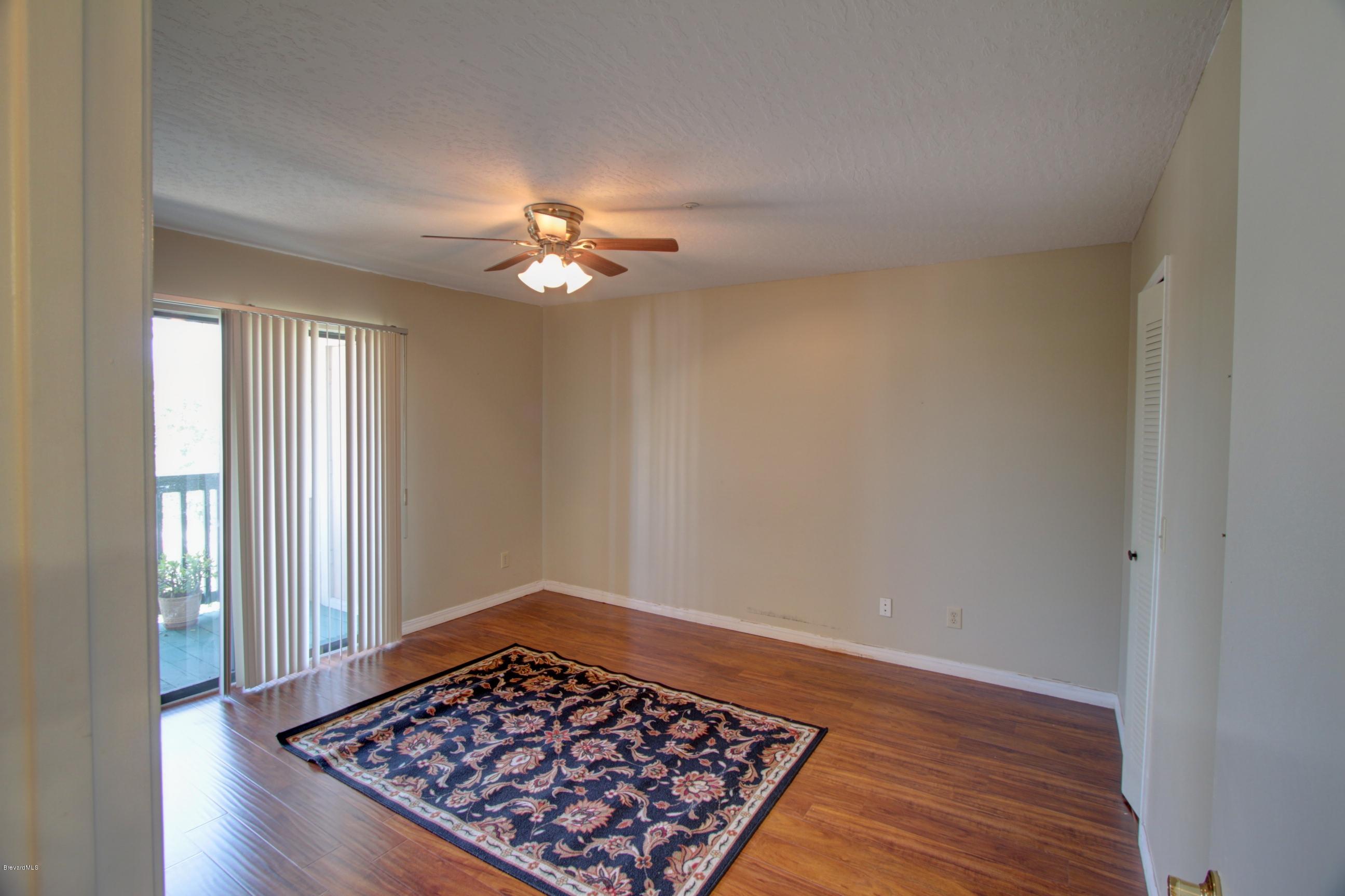 7667 North Wickham Road, Unit 420 Melbourne, FL 32940 - Photo 10 of 19 IMG_5212_3_4_Interior 2