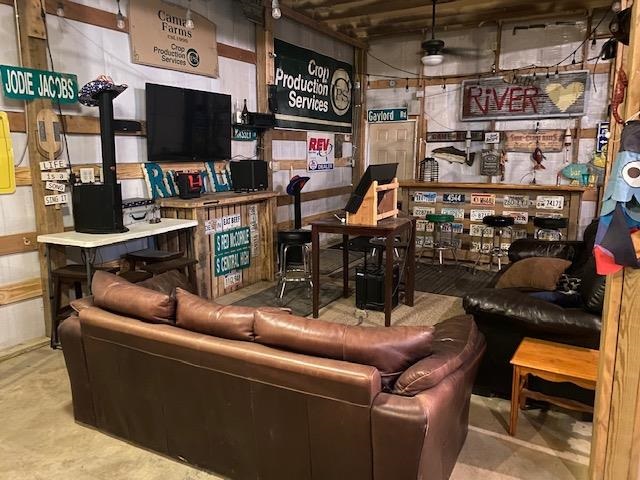 0 Ali Grace Lane Adamsville, TN 38310 - Photo 18 of 27 a living room with furniture and a flat screen tv