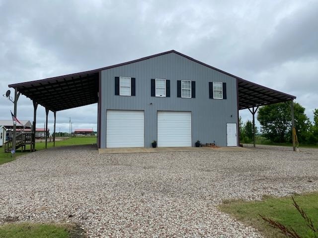 0 Ali Grace Lane Adamsville, TN 38310 - Photo 25 of 27 a backyard of a house with lots of green space