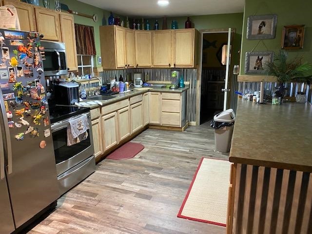 0 Ali Grace Lane Adamsville, TN 38310 - Photo 3 of 27 a kitchen with stainless steel appliances granite countertop a stove a sink and a refrigerator