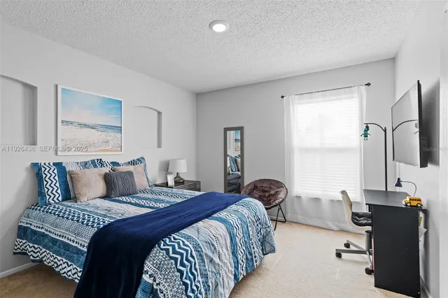a bathroom with a sink toilet and mirror