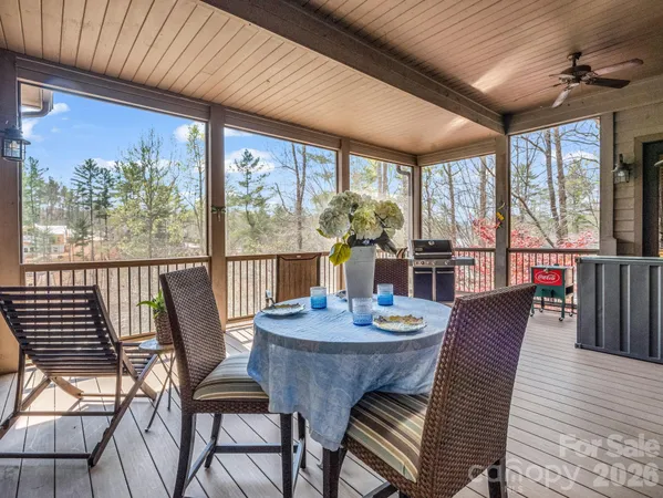 a balcony with wooden floor