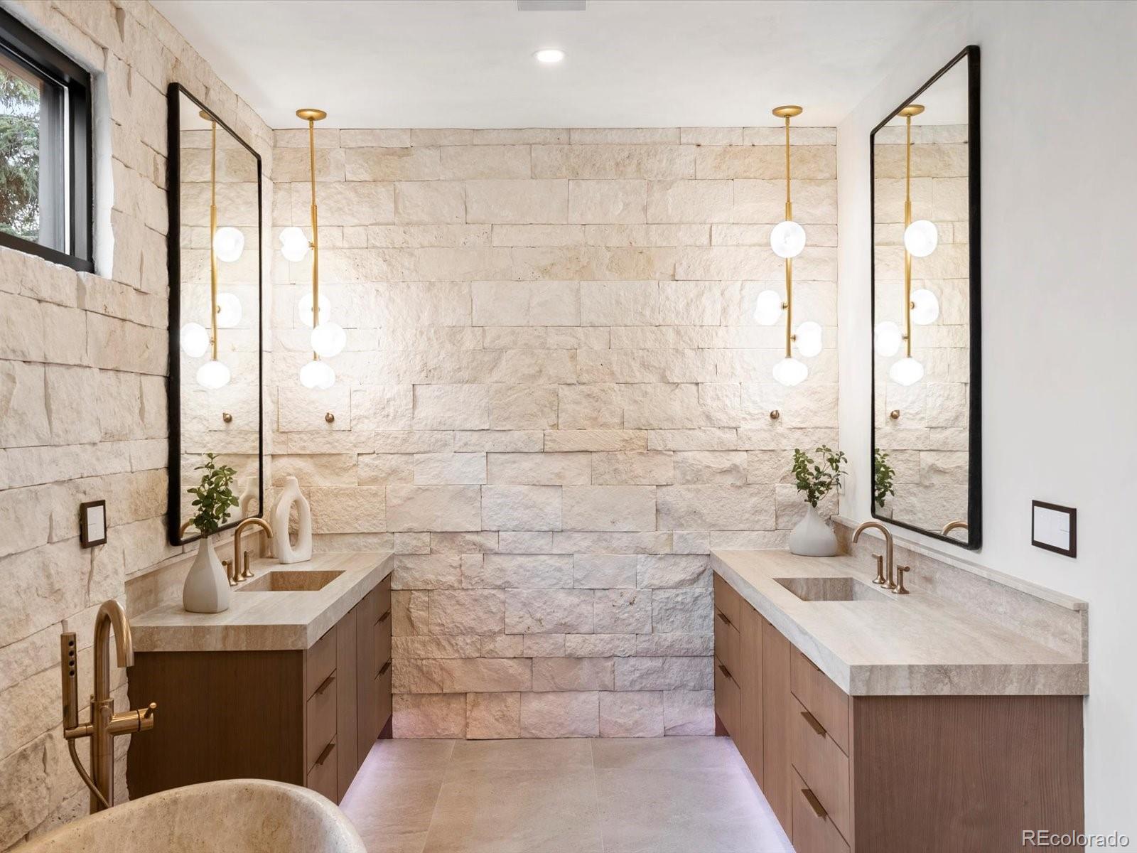 950 South Steele Street Denver, CO 80209 - Photo 24 of 39 a bathroom with a sink and a mirror
