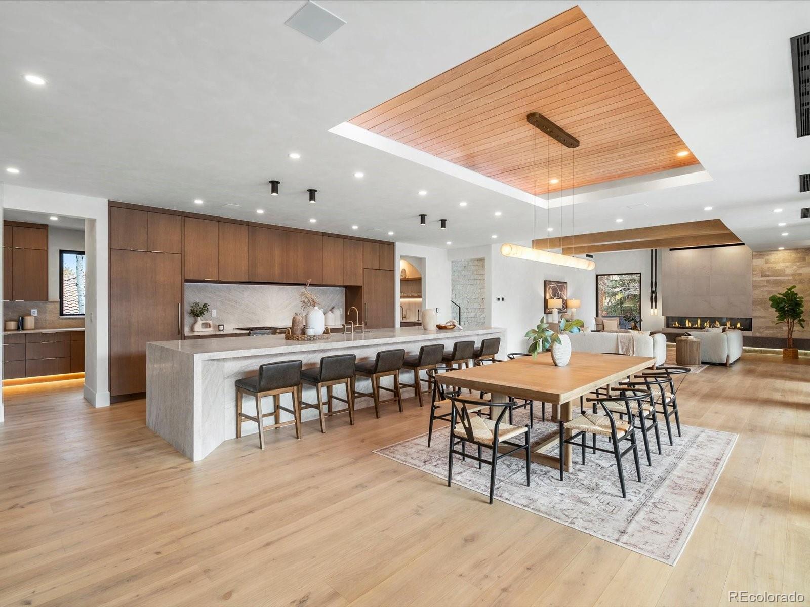 950 South Steele Street Denver, CO 80209 - Photo 7 of 39 a view of a dining room with furniture and wooden floor