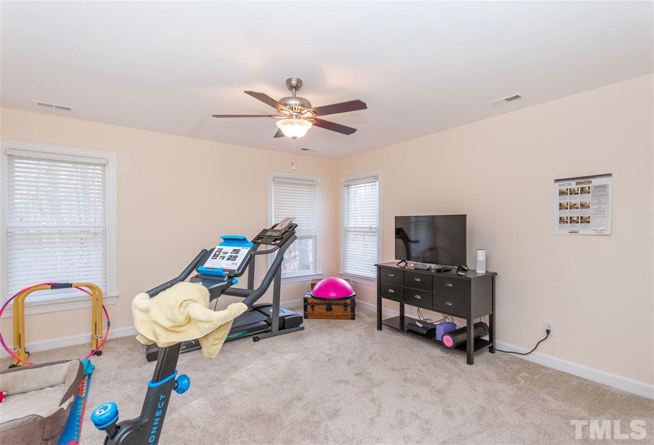 6020 Wild Orchid Trail Raleigh, NC 27613 - Photo 21 of 26 The large bedroom would also be a great workout room or bonus/playroom!