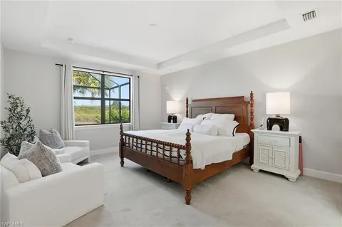 a bed room with a bed and a couch