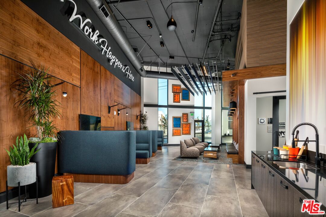 1101 North Main Street, Unit B326 Los Angeles, CA 90012 - Photo 15 of 35 a living room with furniture