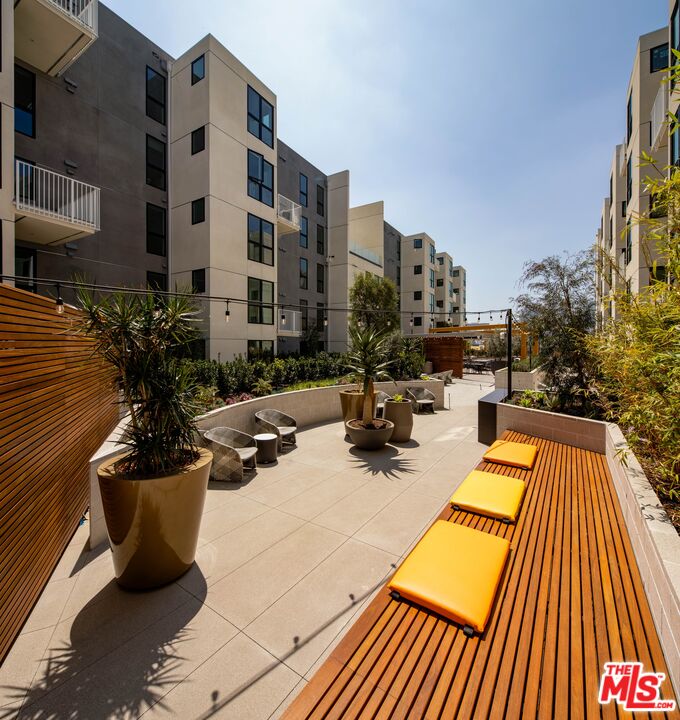 1101 North Main Street, Unit B326 Los Angeles, CA 90012 - Photo 25 of 35 a view of a patio with swimming pool