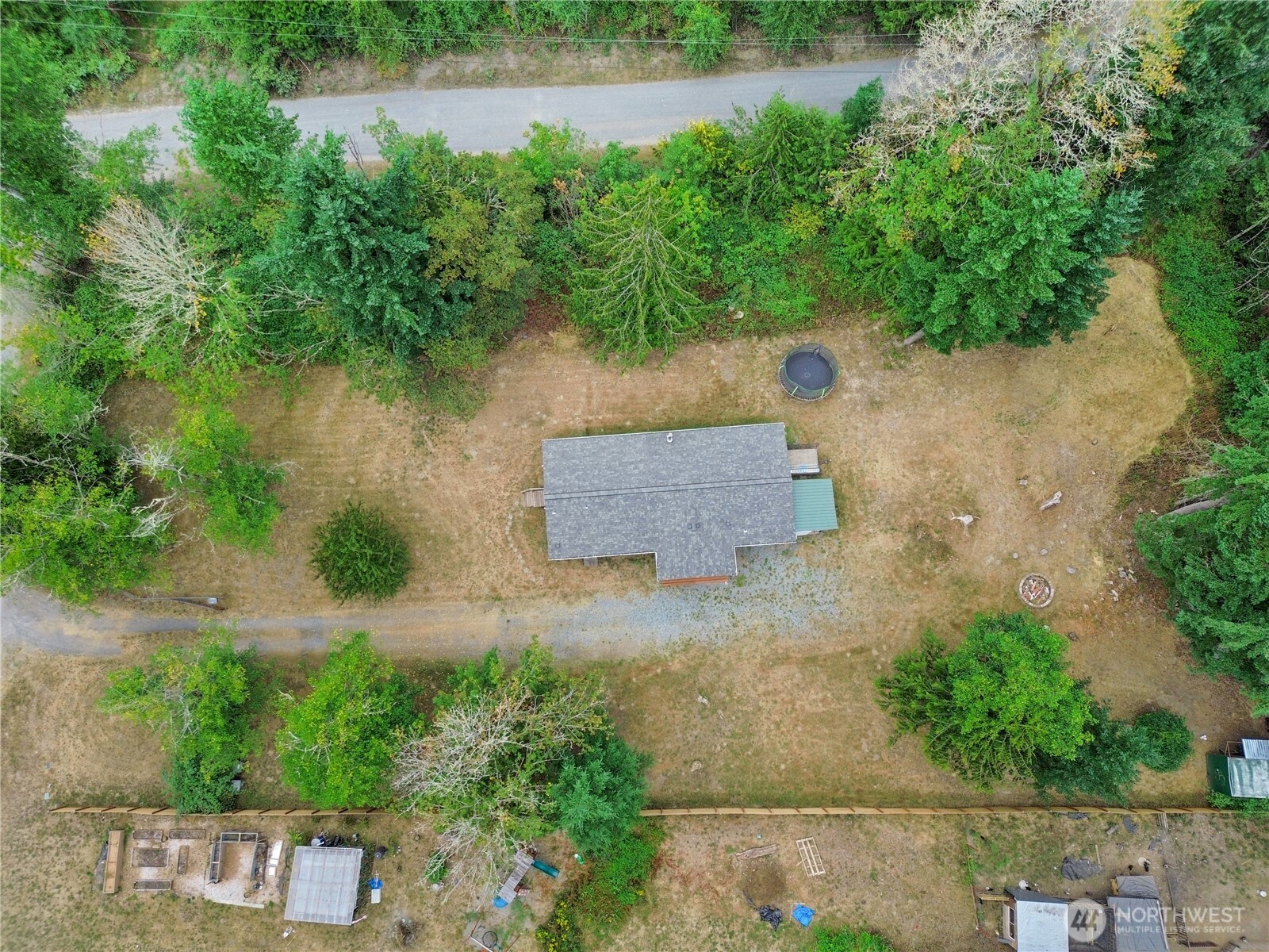 28205 73rd Avenue East Graham, WA 98338 - Photo 18 of 20 an aerial view of a house with outdoor space and lake view