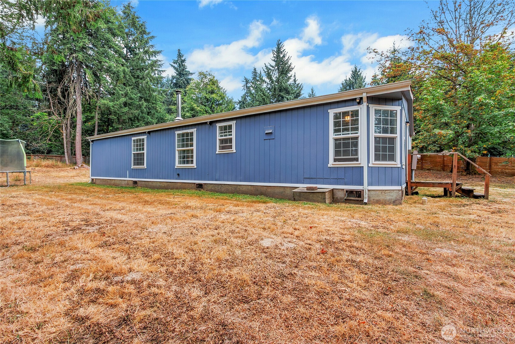 28205 73rd Avenue East Graham, WA 98338 - Photo 19 of 20 a house view with a garden space
