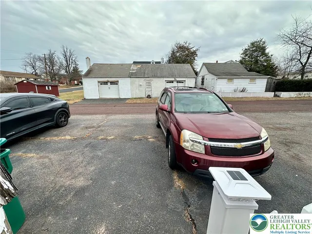 a view of outdoor space and parking