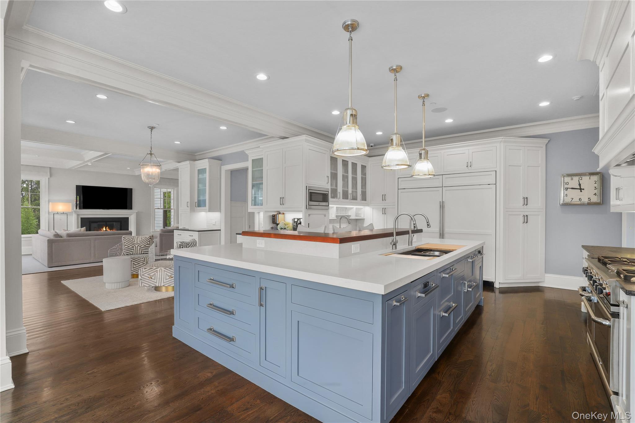 6 Stone Bridge Road Purchase, NY 10577 - Photo 10 of 45 a large kitchen with stainless steel appliances kitchen island granite countertop a large center island and a sink