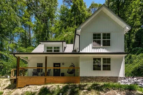 a front view of a house with garage