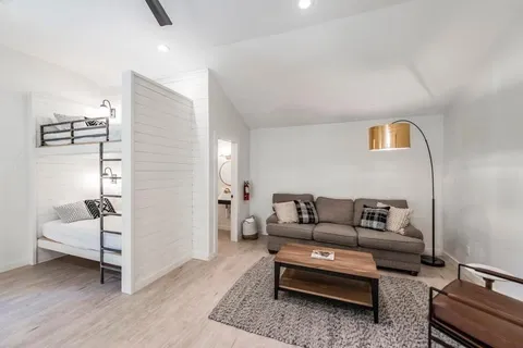 a living room with furniture and a couch