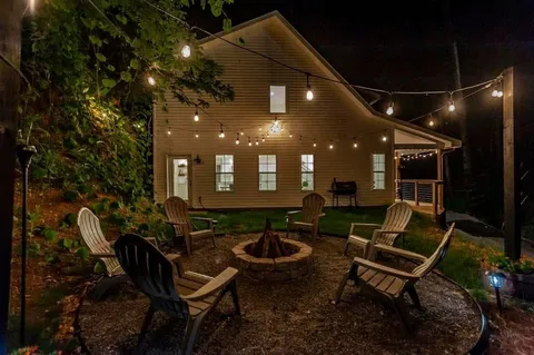 a building outdoor space with patio furniture and a potted plant
